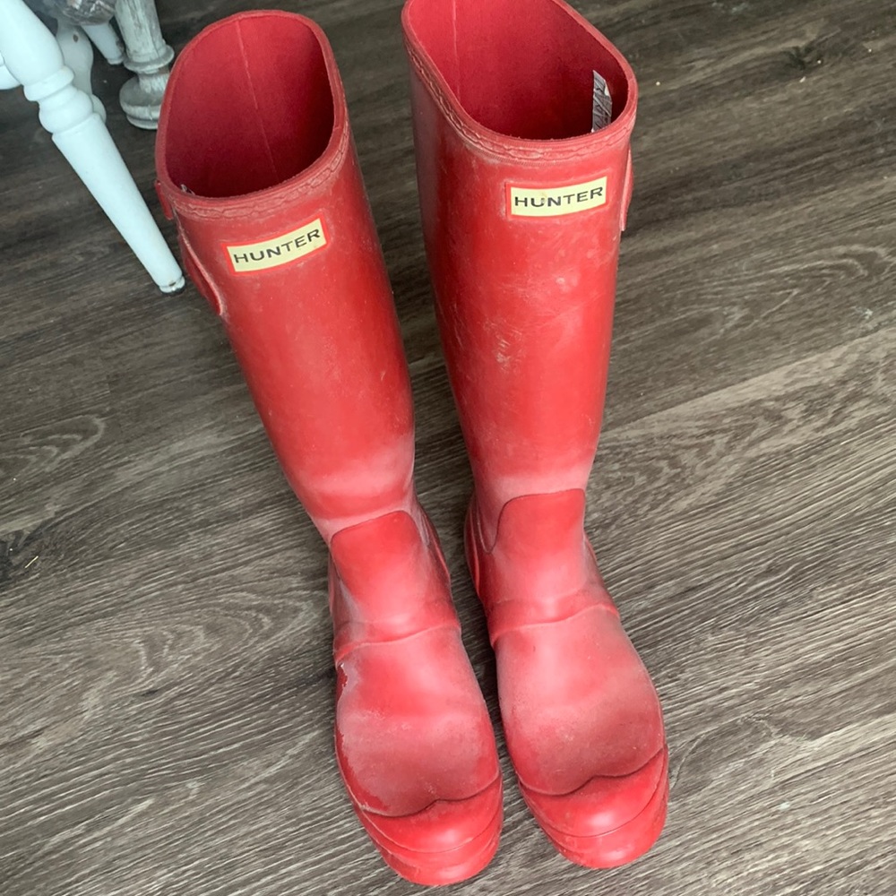 Tall red hunter rain boots